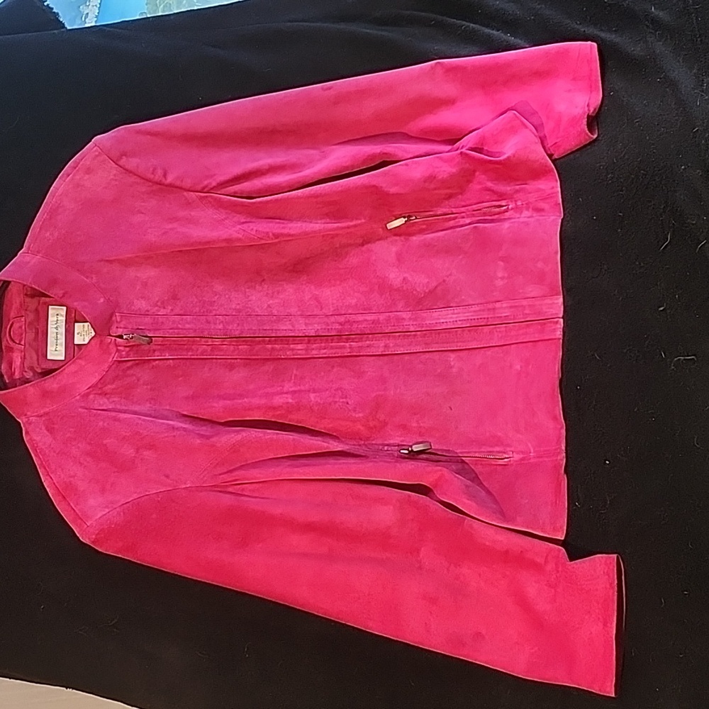 A pink genuine leather waist length jacket